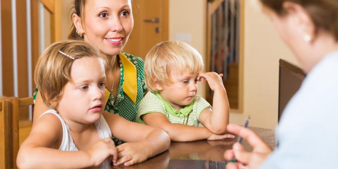 mother and two children talking 