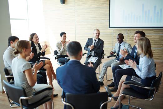 group in a circle being trained